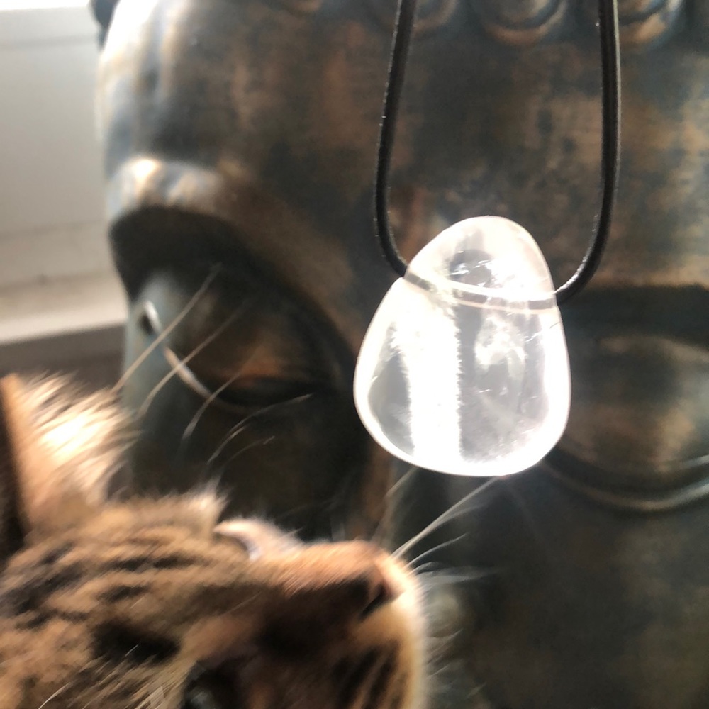 Clear quartz pendant on leather adjustable cord